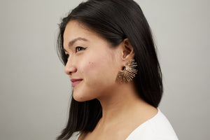 Gold starburst earrings